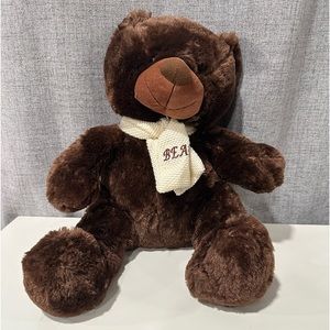 Brown teddy bear with scarf